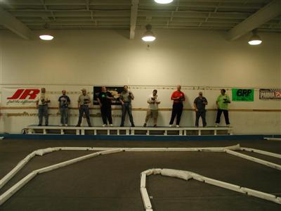 Drivers from the 1/18th scale BRP class up on the stand. (Click to enlarge)
