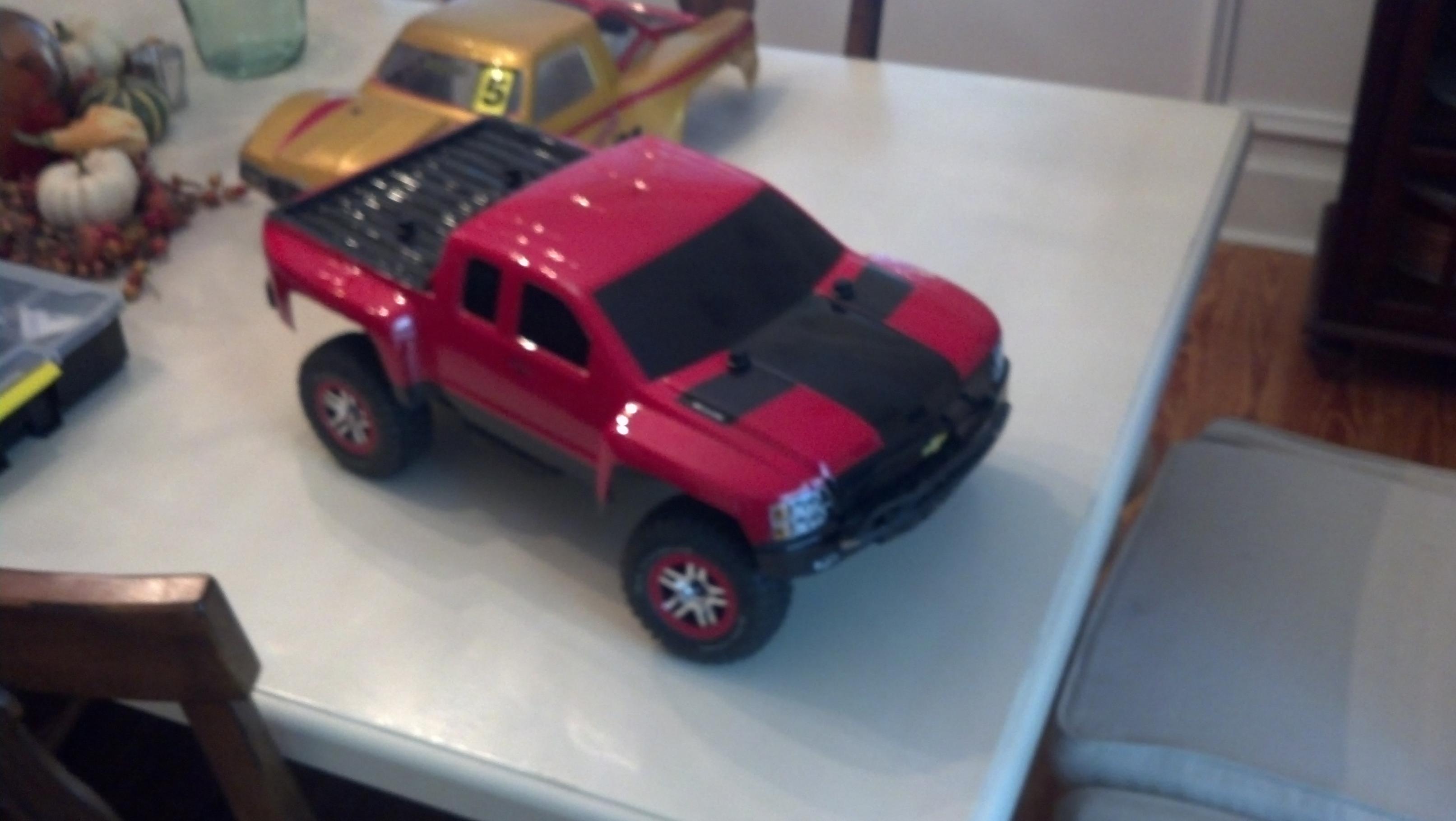 traxxas slash 4x4 platinum vs ultimate